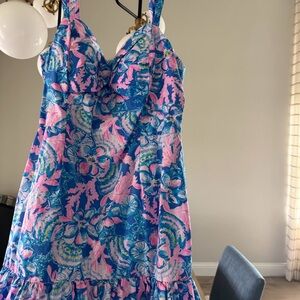 Lilly Pulitzer Blue and Pink Floral Dress/ Romper 
Rocko Romper in Blue Tang